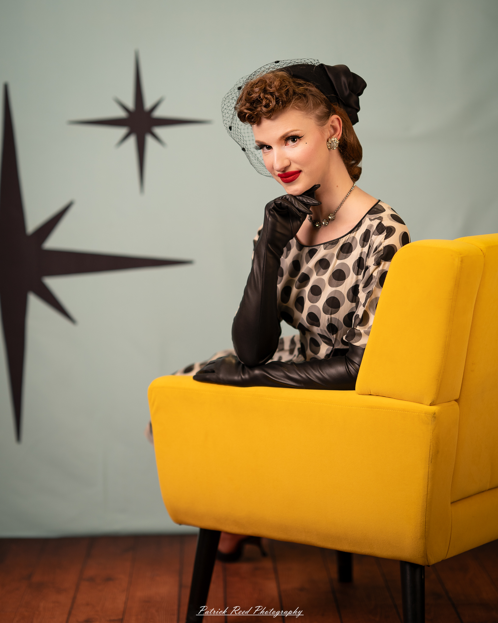 A retro-inspired portrait series of a model named Noelle photographed on March 13, 2026, featuring mid-century fashion styling, vintage hairstyles, colorful studio sets, and dramatic editorial lighting.