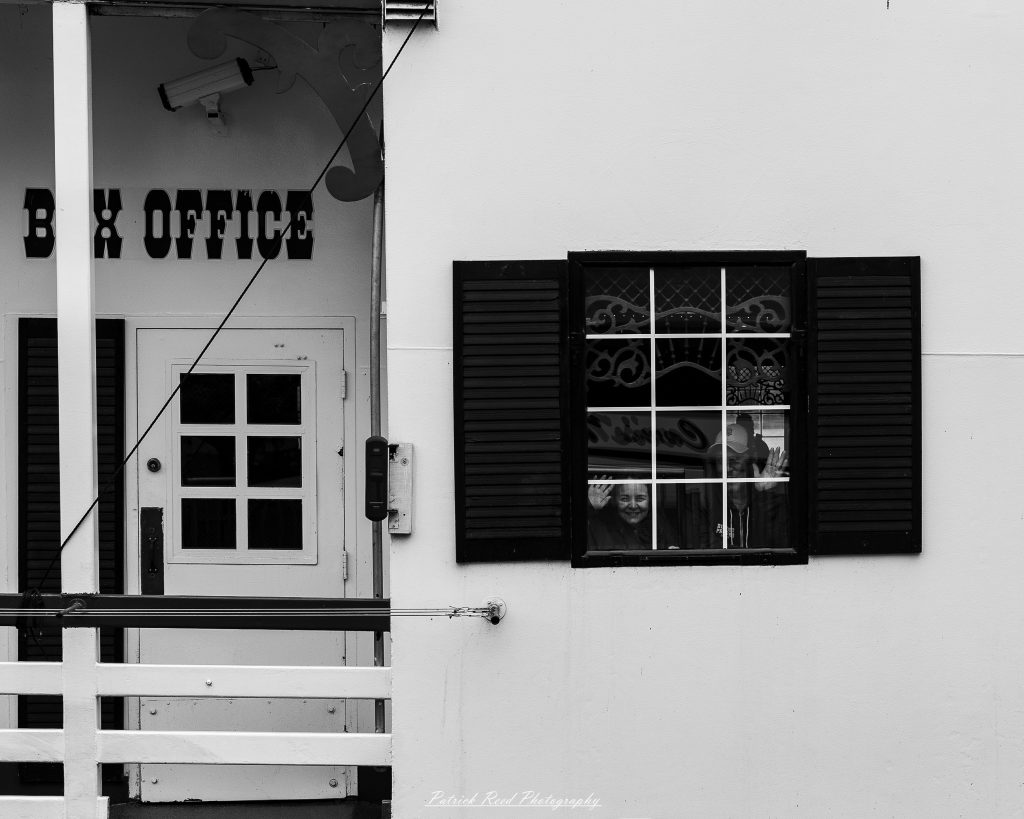 Black and white street photography in downtown Detroit, Michigan capturing urban architecture, city life, public art, and Detroit riverfront scenes in a documentary photography style.