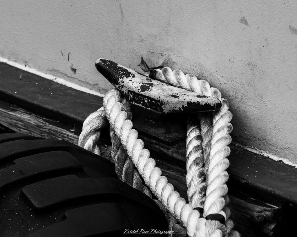 Black and white street photography in downtown Detroit, Michigan capturing urban architecture, city life, public art, and Detroit riverfront scenes in a documentary photography style.