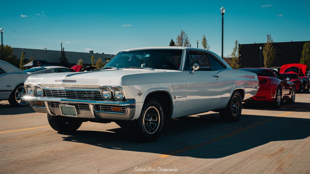 Classic car photography from a Michigan car show featuring vintage muscle cars, hot rods, classic trucks, and automotive detail shots captured in a cinematic documentary style.
