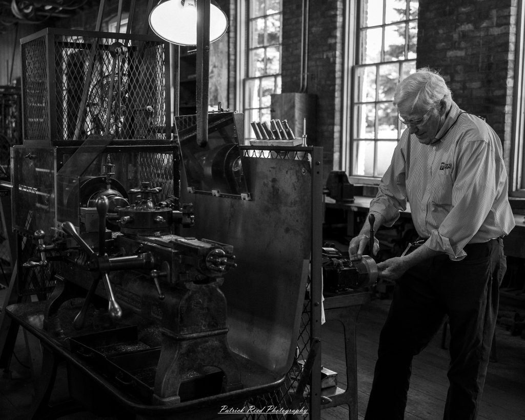 Photographs from Greenfield Village in Dearborn, Michigan, showcasing historic architecture, vintage vehicles, working trades, and cultural landmarks through documentary and street photography.