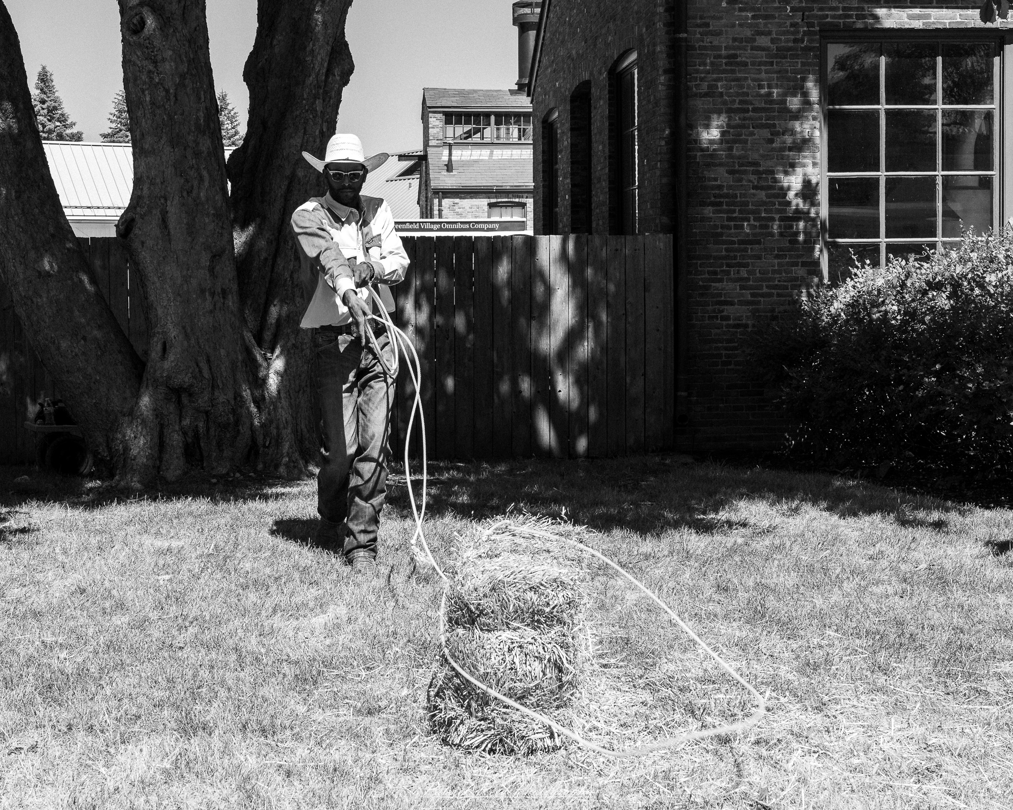 Photographs from Greenfield Village in Dearborn, Michigan, showcasing historic architecture, vintage vehicles, working trades, and cultural landmarks through documentary and street photography.