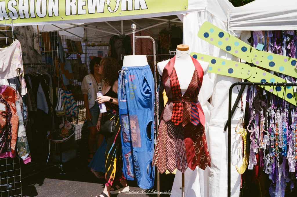 Street photography captured on a Rollei 35S at Peacefest in Waterford, Michigan, featuring festival attendees, live entertainment, community activities, and candid moments documented on 35mm film.