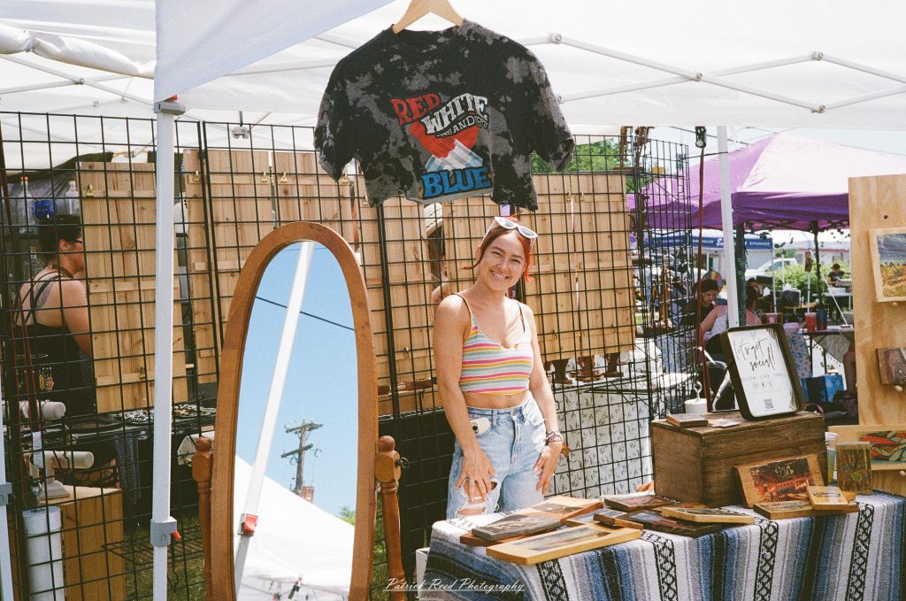 Street photography captured on a Rollei 35S at Peacefest in Waterford, Michigan, featuring festival attendees, live entertainment, community activities, and candid moments documented on 35mm film.