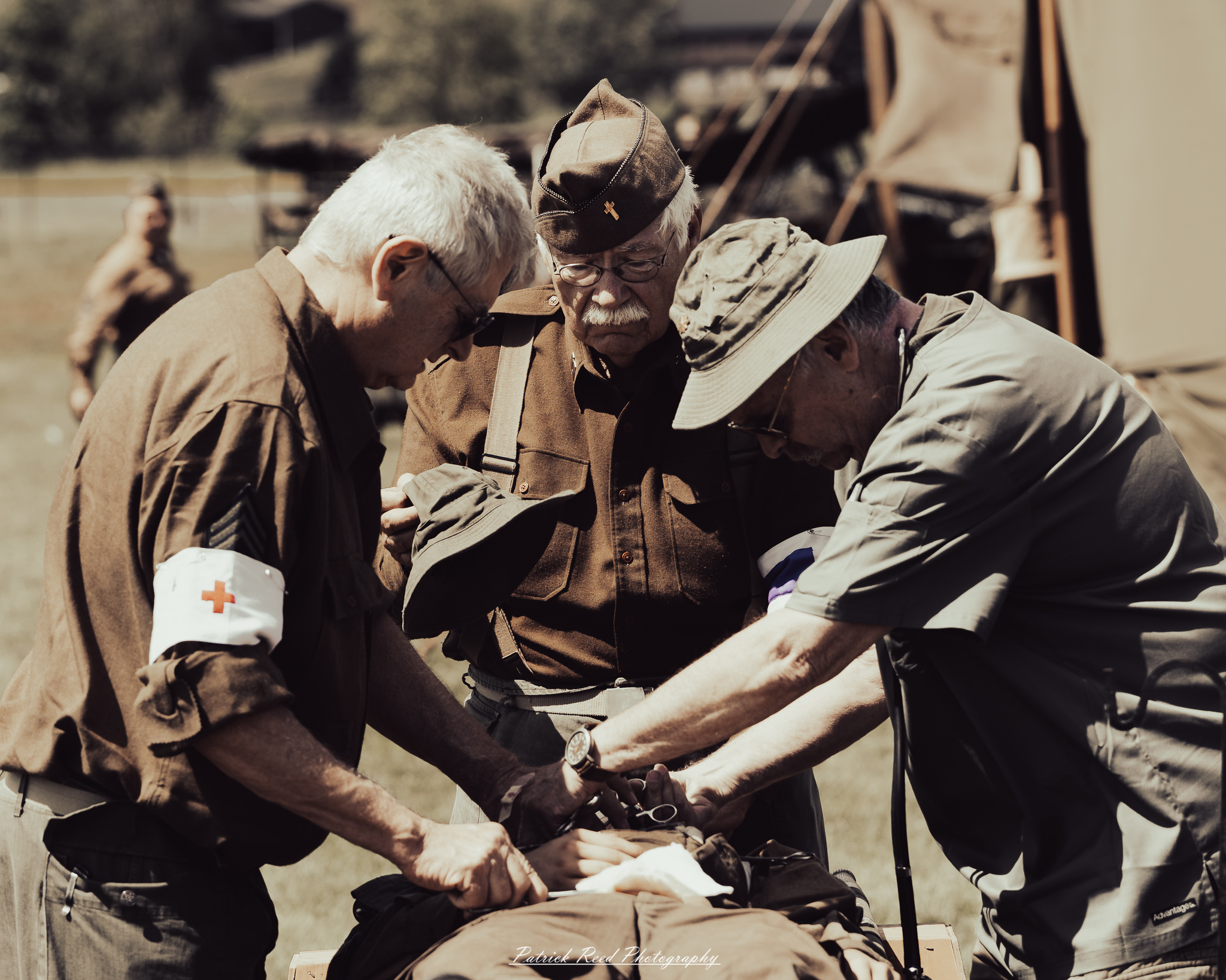 Documentary photographs of World War II reenactors at the Steam Railroading Institute, featuring authentic military uniforms, vintage trains, historical equipment, and living history demonstrations.