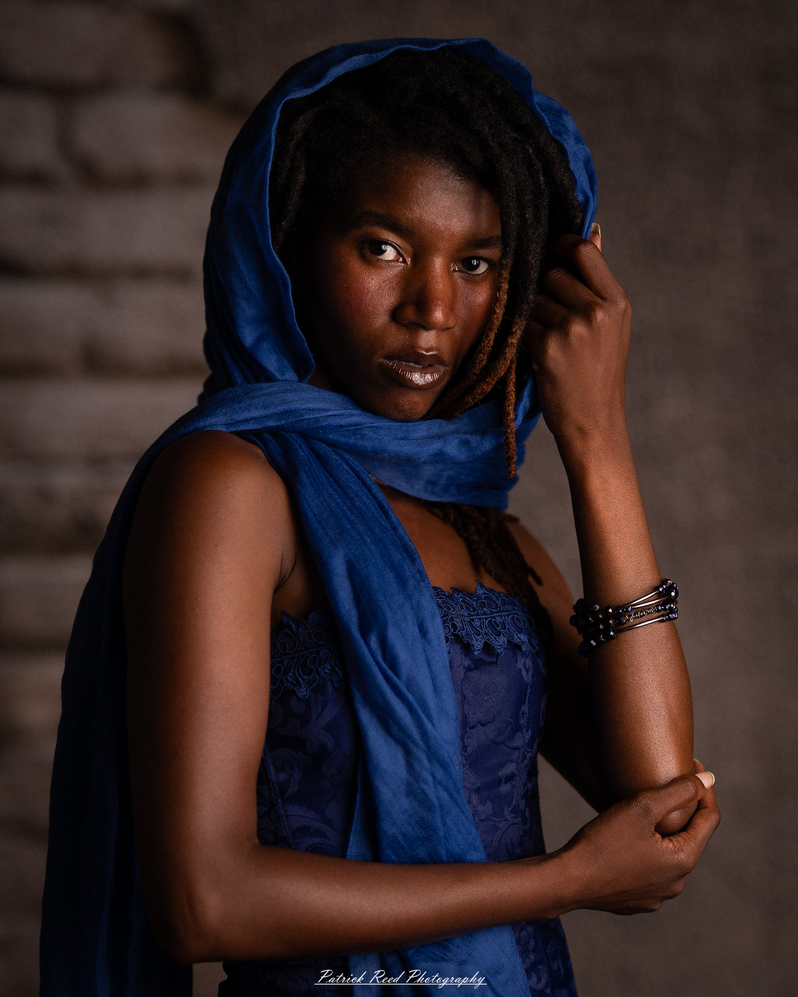 Studio editorial portraits featuring model Deja with dramatic lighting, fine-art black-and-white photography, contemporary fashion, and creative portraiture captured in a Detroit-area photography studio.