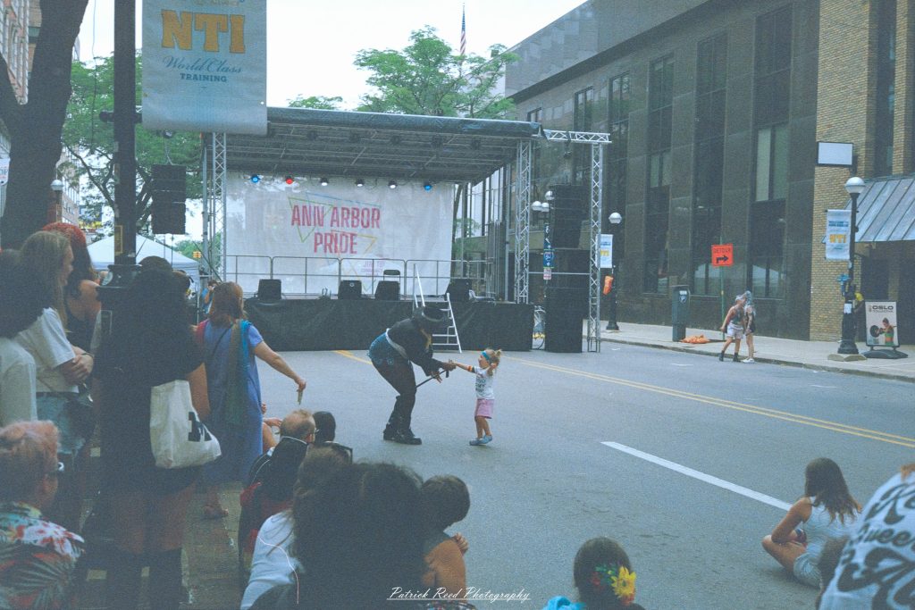 Ann Arbor Pride 2026 parade crowd celebrating LGBTQ+ equality on downtown street